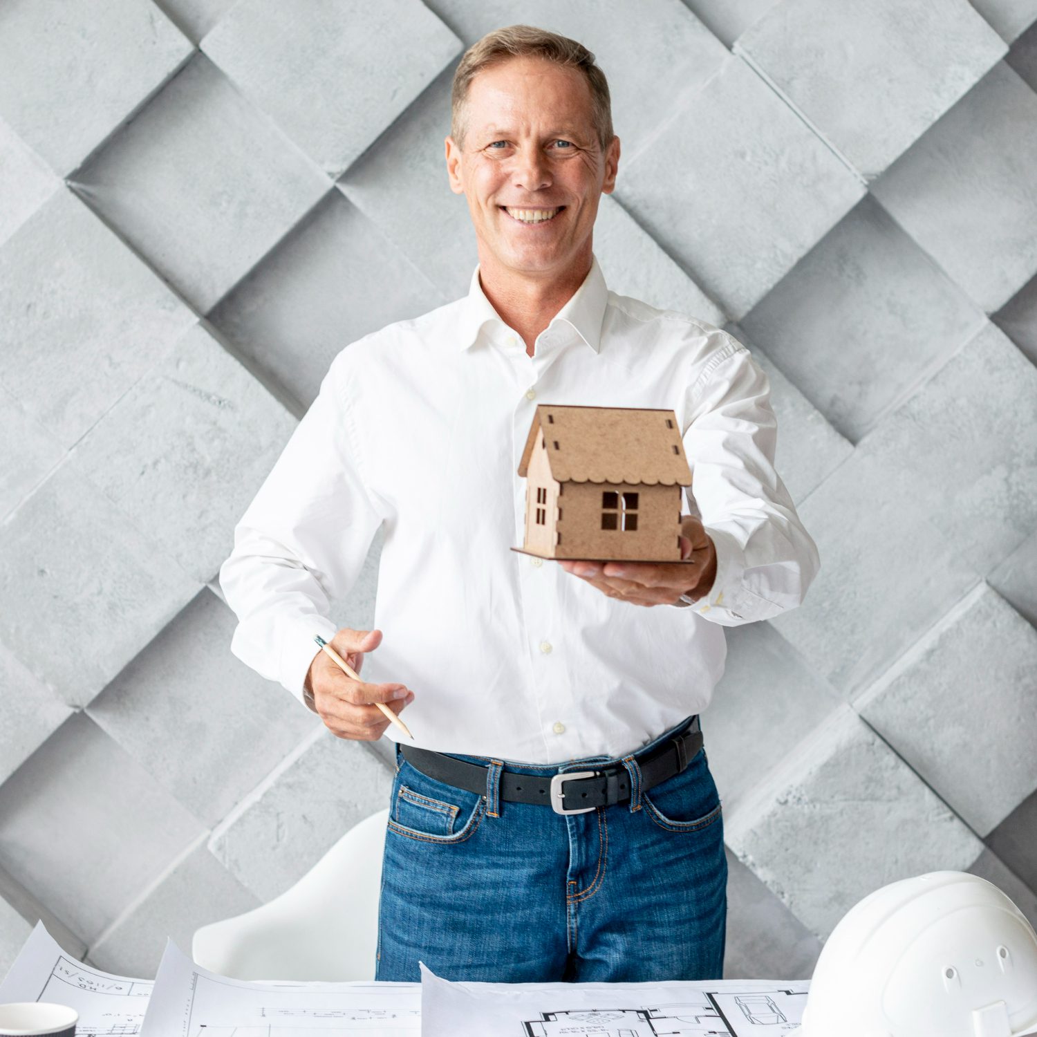 architect-showing-miniature-house